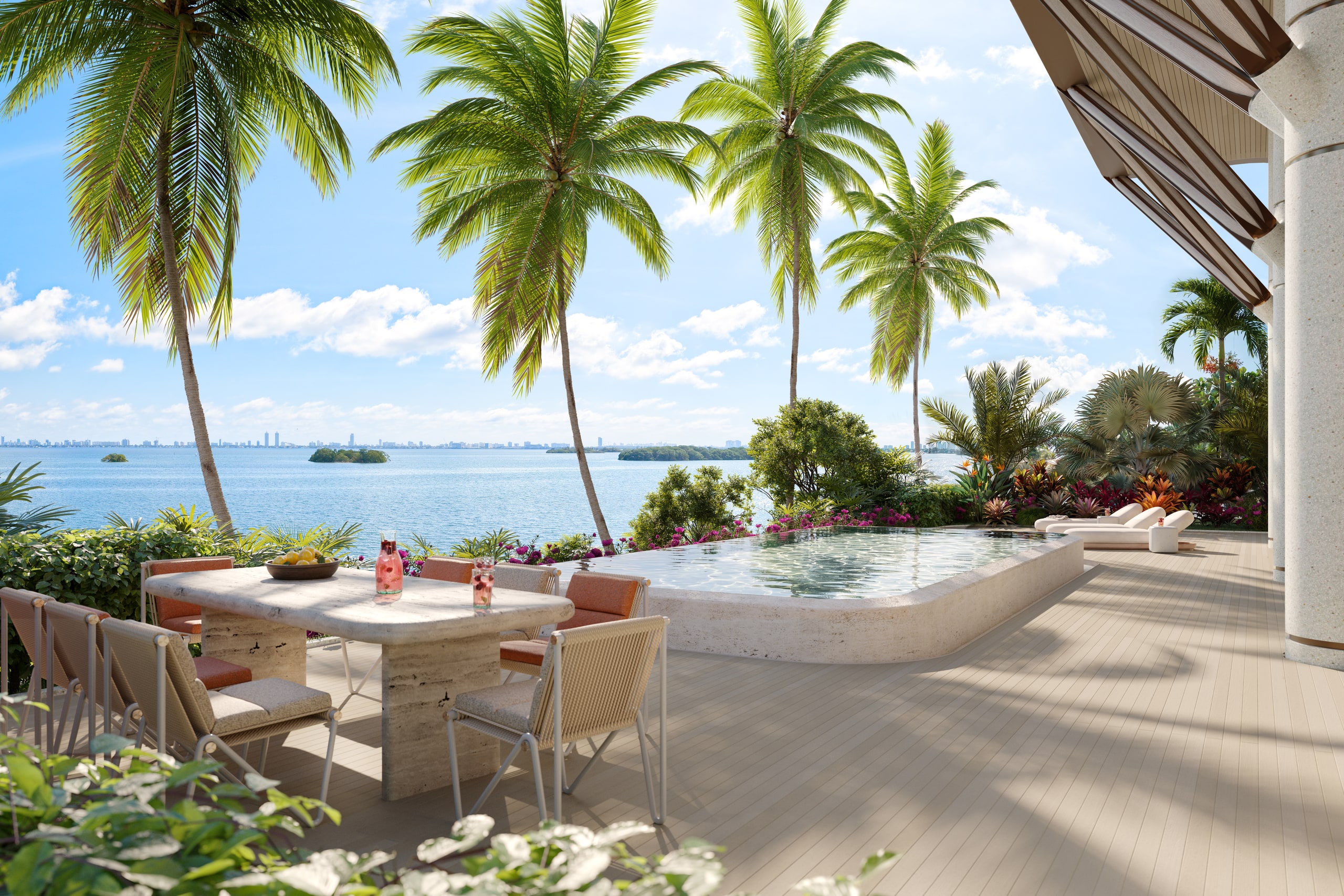 Bayfront terrace with infinity pool overlooking Biscayne Bay and Miami skyline