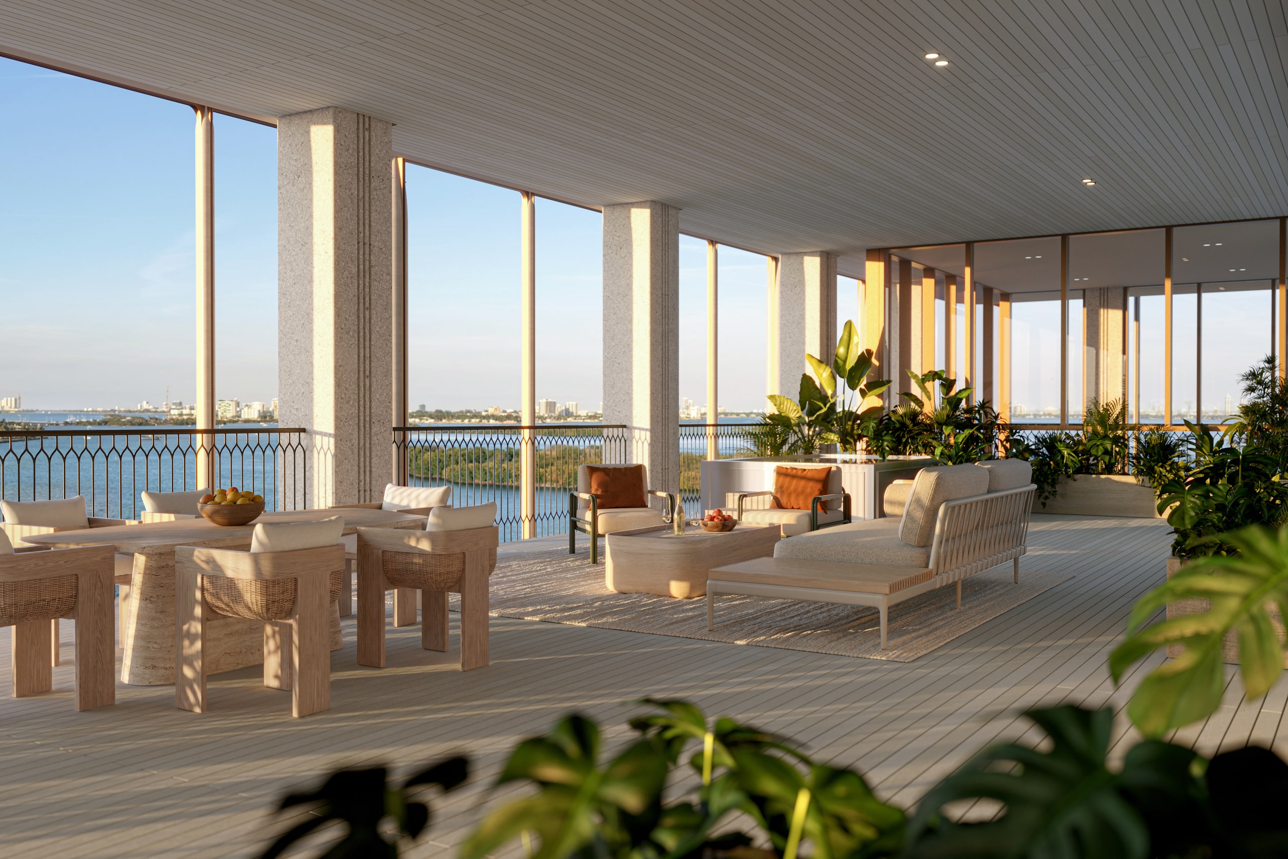 Wraparound terrace with columns and bay sunset views